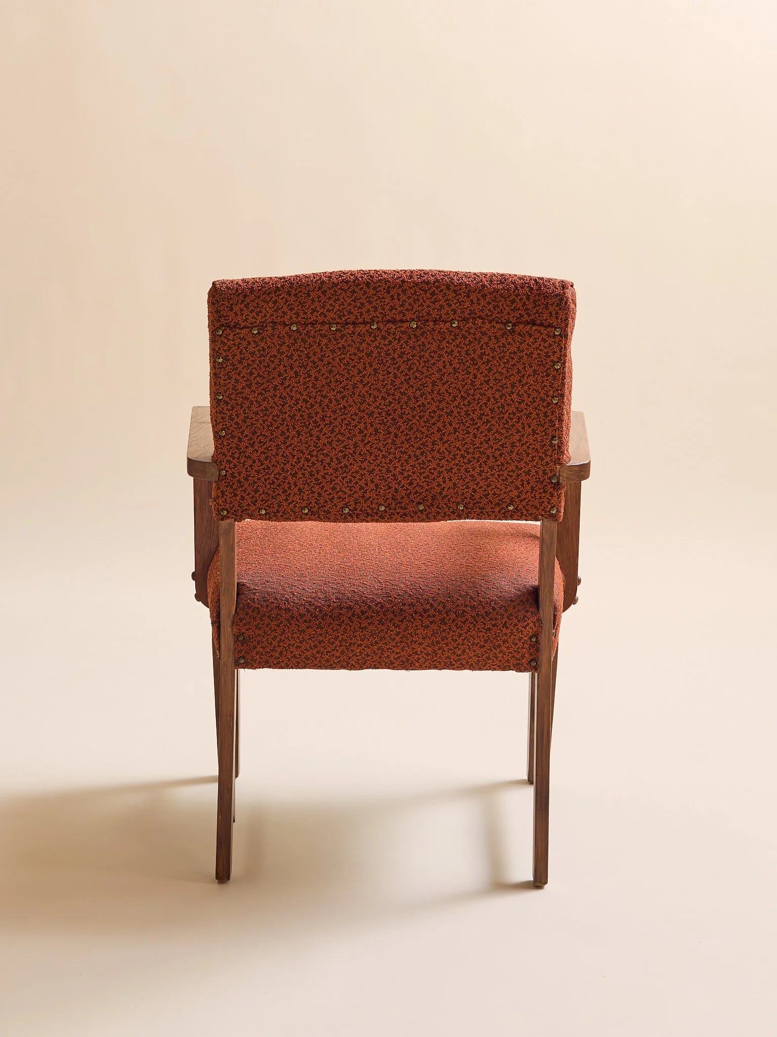 The Vintage Danish-Style Armchair in Rust BoucléSeatingMiscellanea, etc.