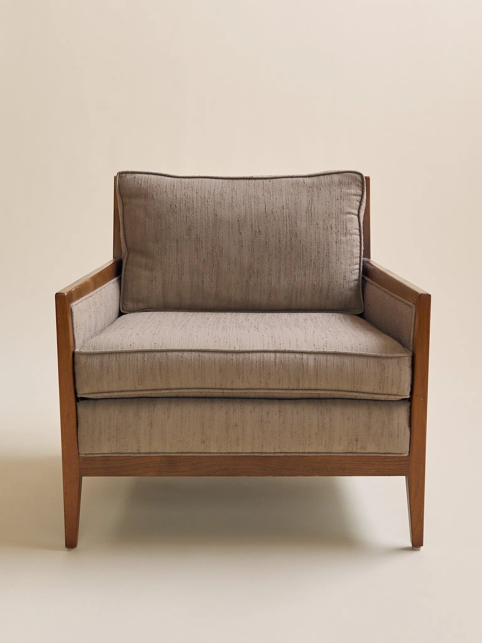 The Vintage Mid Century Walnut Lounge Chair in Textured Beige UpholsterySeatingMiscellanea, etc.