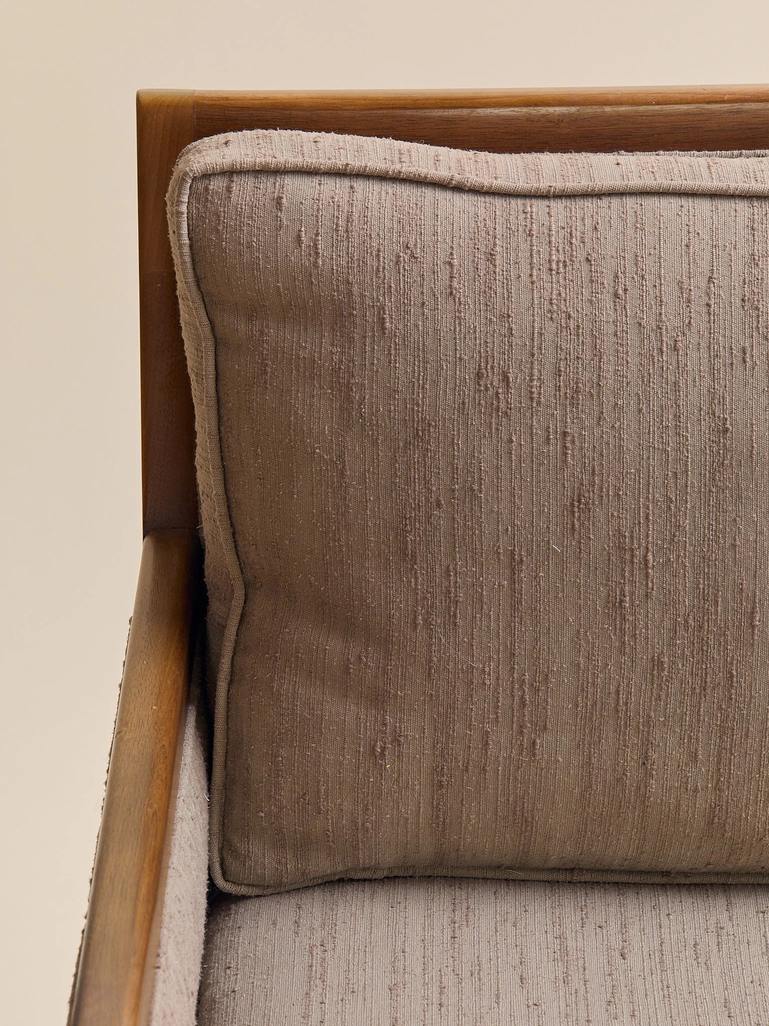 The Vintage Mid Century Walnut Lounge Chair in Textured Beige UpholsterySeatingMiscellanea, etc.