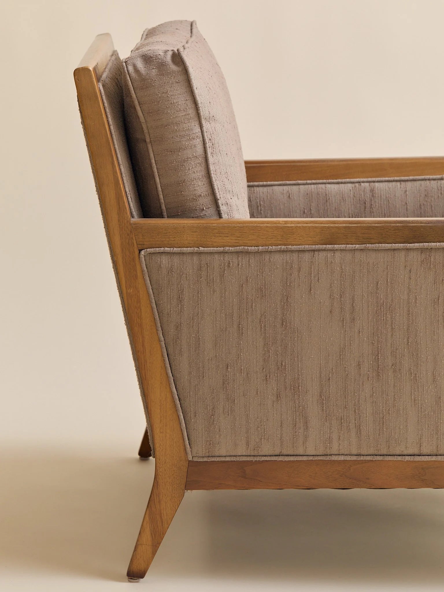 The Vintage Mid Century Walnut Lounge Chair in Textured Beige UpholsterySeatingMiscellanea, etc.