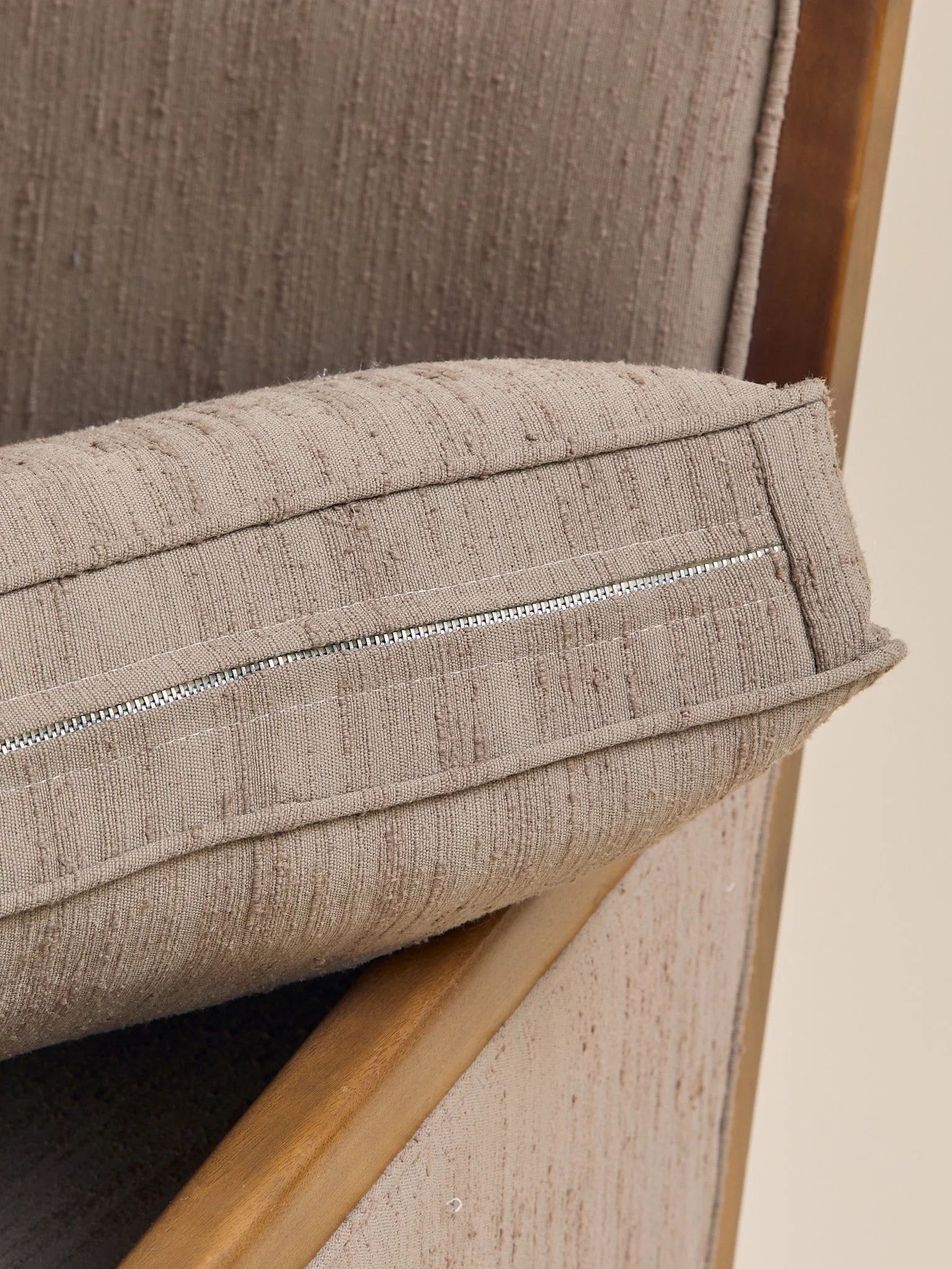 The Vintage Mid Century Walnut Lounge Chair in Textured Beige UpholsterySeatingMiscellanea, etc.