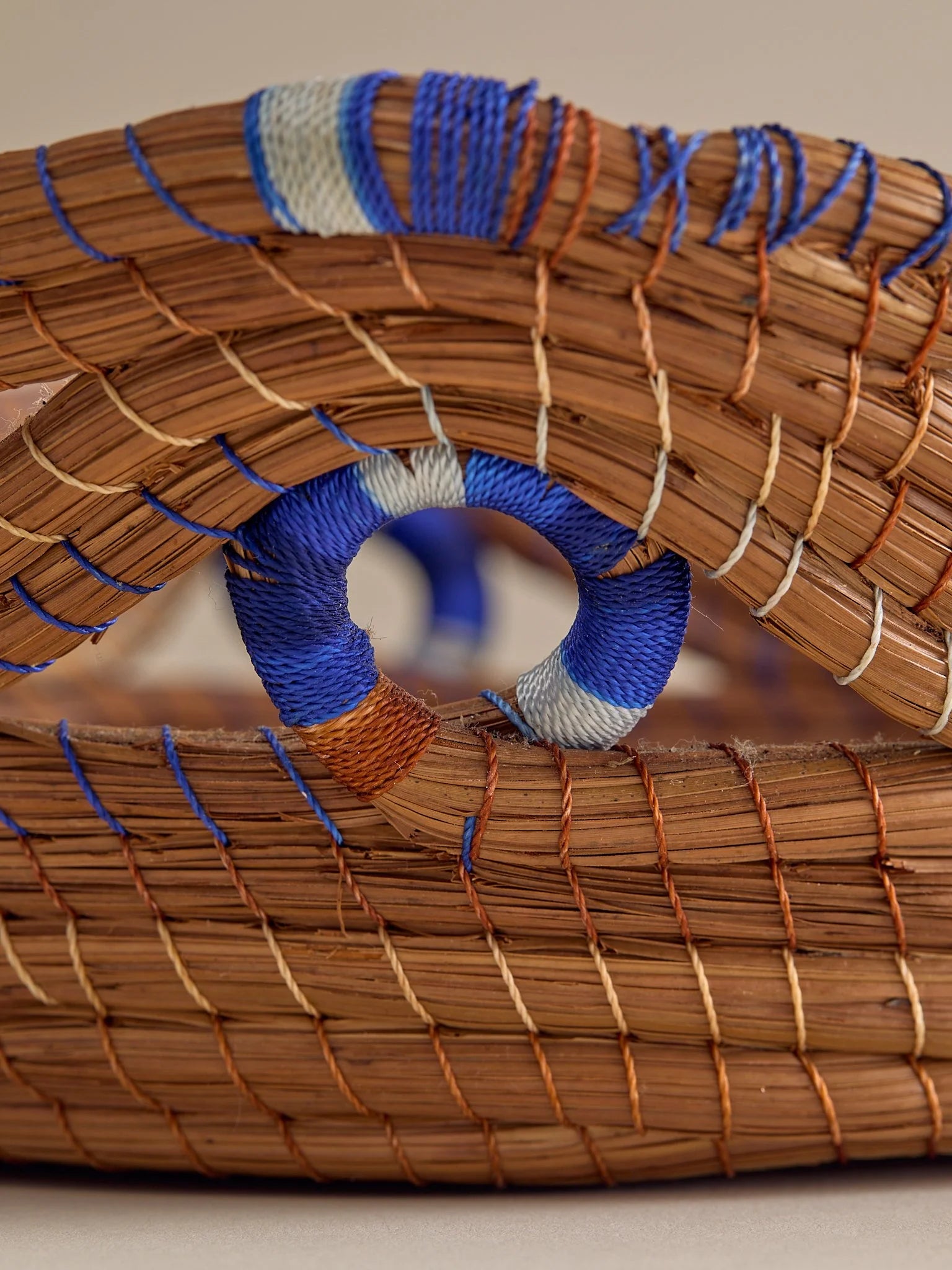 The Vintage Handwoven Basket with Blue and White DetailTrays and BowlsMiscellanea, etc.