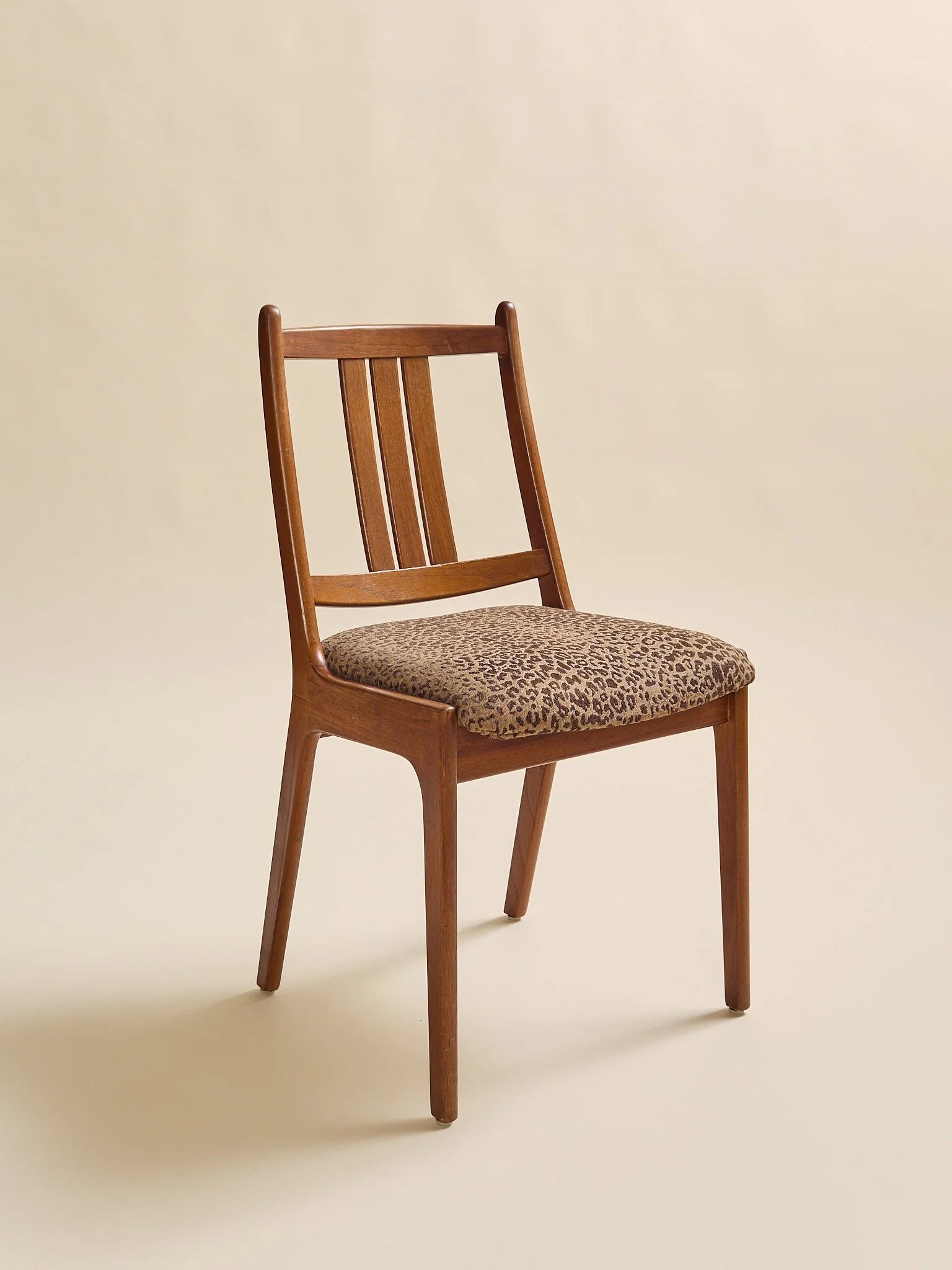 The Vintage Danish Teak MCM Leopard Accent ChairSeatingMiscellanea, etc.
