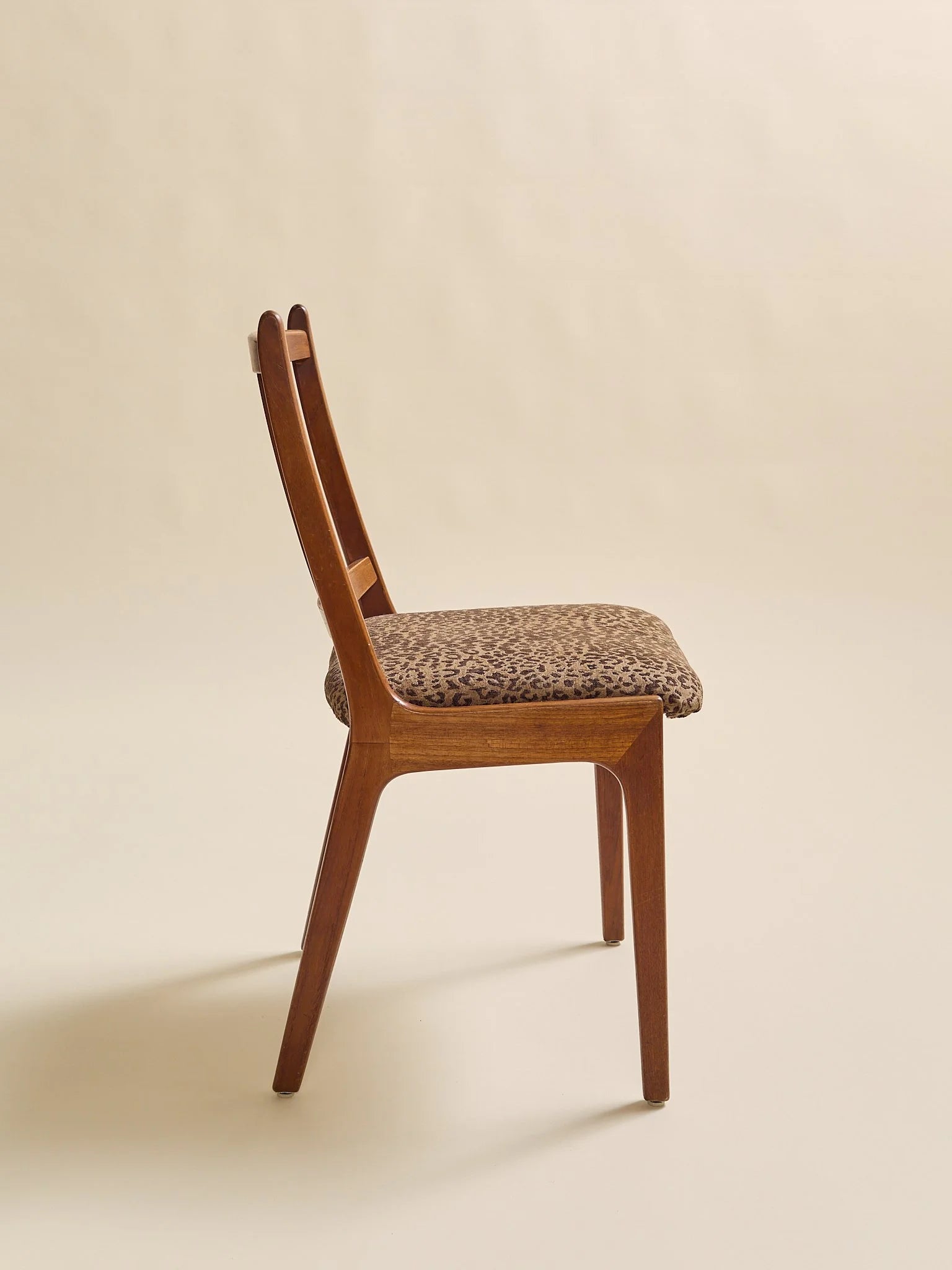 The Vintage Danish Teak MCM Leopard Accent ChairSeatingMiscellanea, etc.