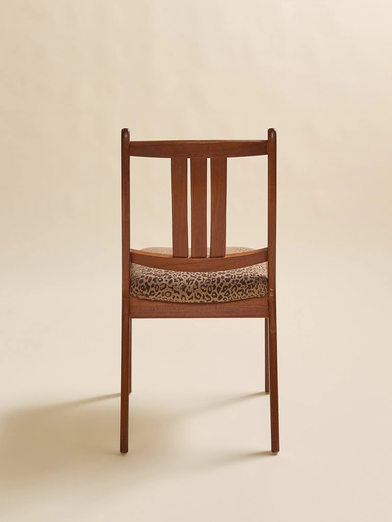 The Vintage Danish Teak MCM Leopard Accent ChairSeatingMiscellanea, etc.