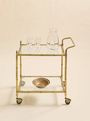 The Vintage Hollywood Regency Faux Bamboo Brass Bar CartAccentsMiscellanea, etc.