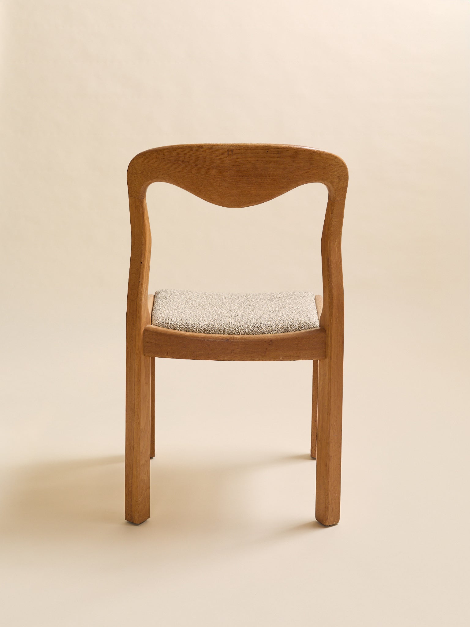 The Vintage Style Of Moller Oak & Boucle Dining Chairs, Set of Four, 1970sSeatingMiscellanea, etc.