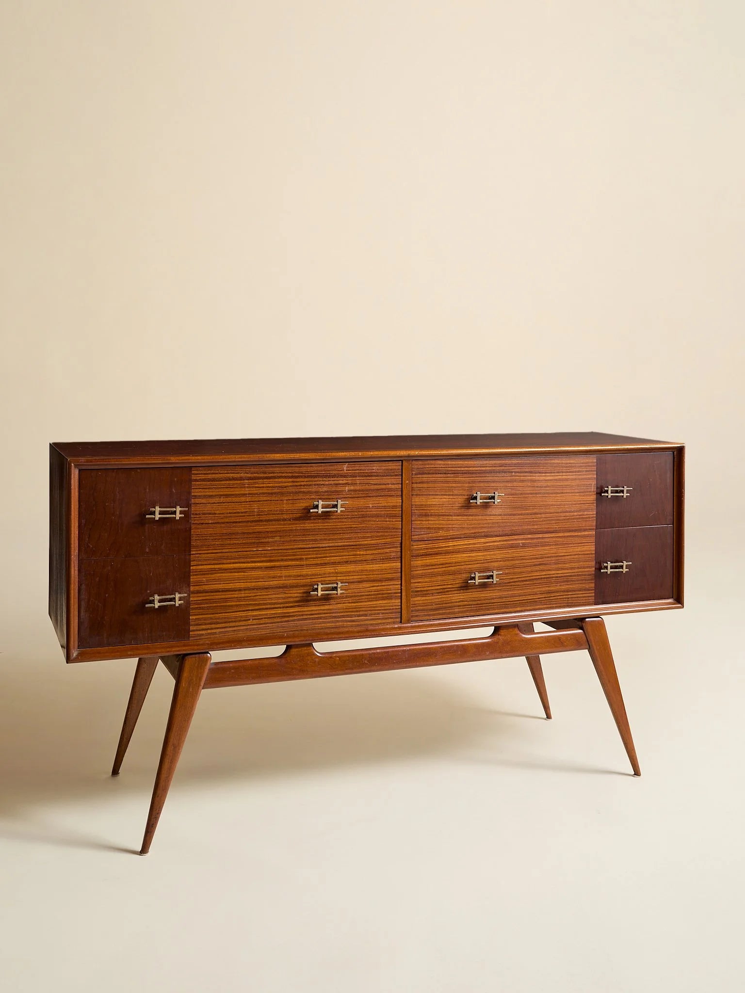 The Vintage 1950s Mahogany And Rosewood Dresser with Brass HardwareChests and DressersMiscellanea, etc.