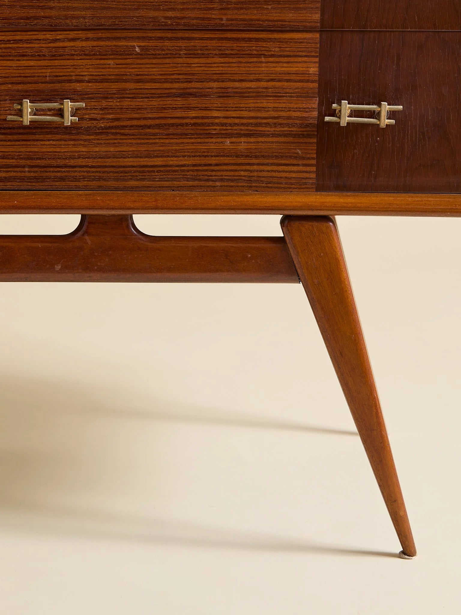 The Vintage 1950s Mahogany And Rosewood Dresser with Brass HardwareChests and DressersMiscellanea, etc.