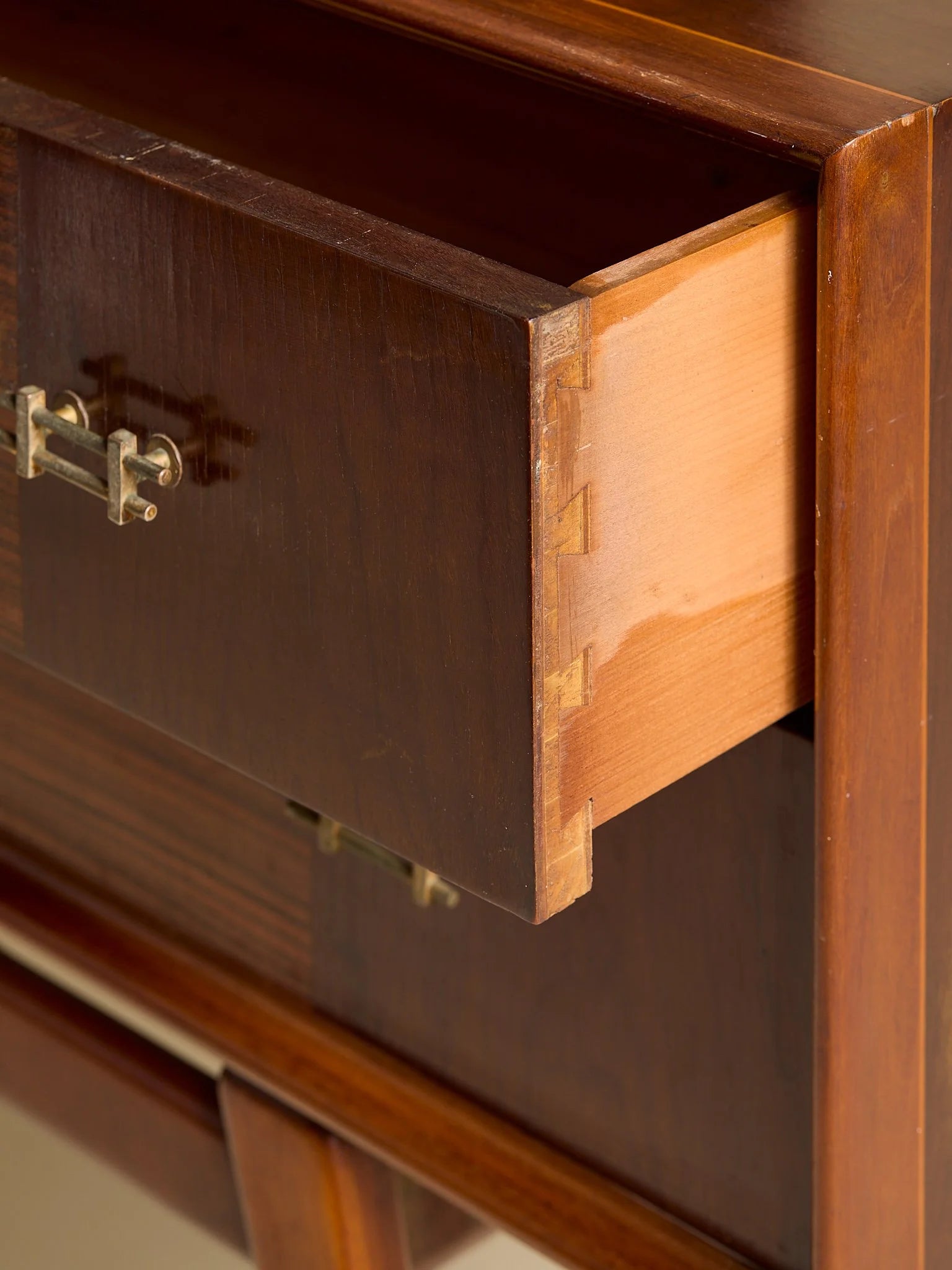The Vintage 1950s Mahogany And Rosewood Dresser with Brass HardwareChests and DressersMiscellanea, etc.
