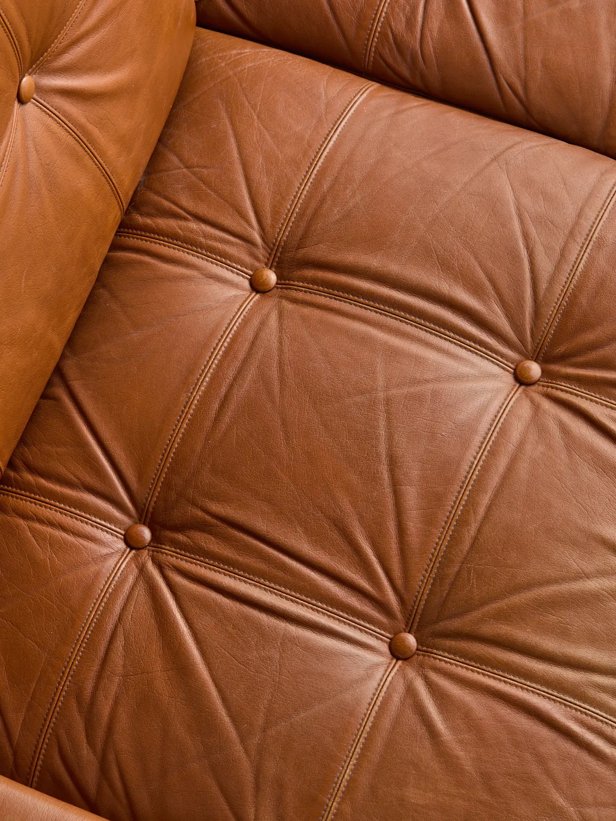 The Vintage Danish Mid-Century Leather LoveseatSeatingMiscellanea, etc.
