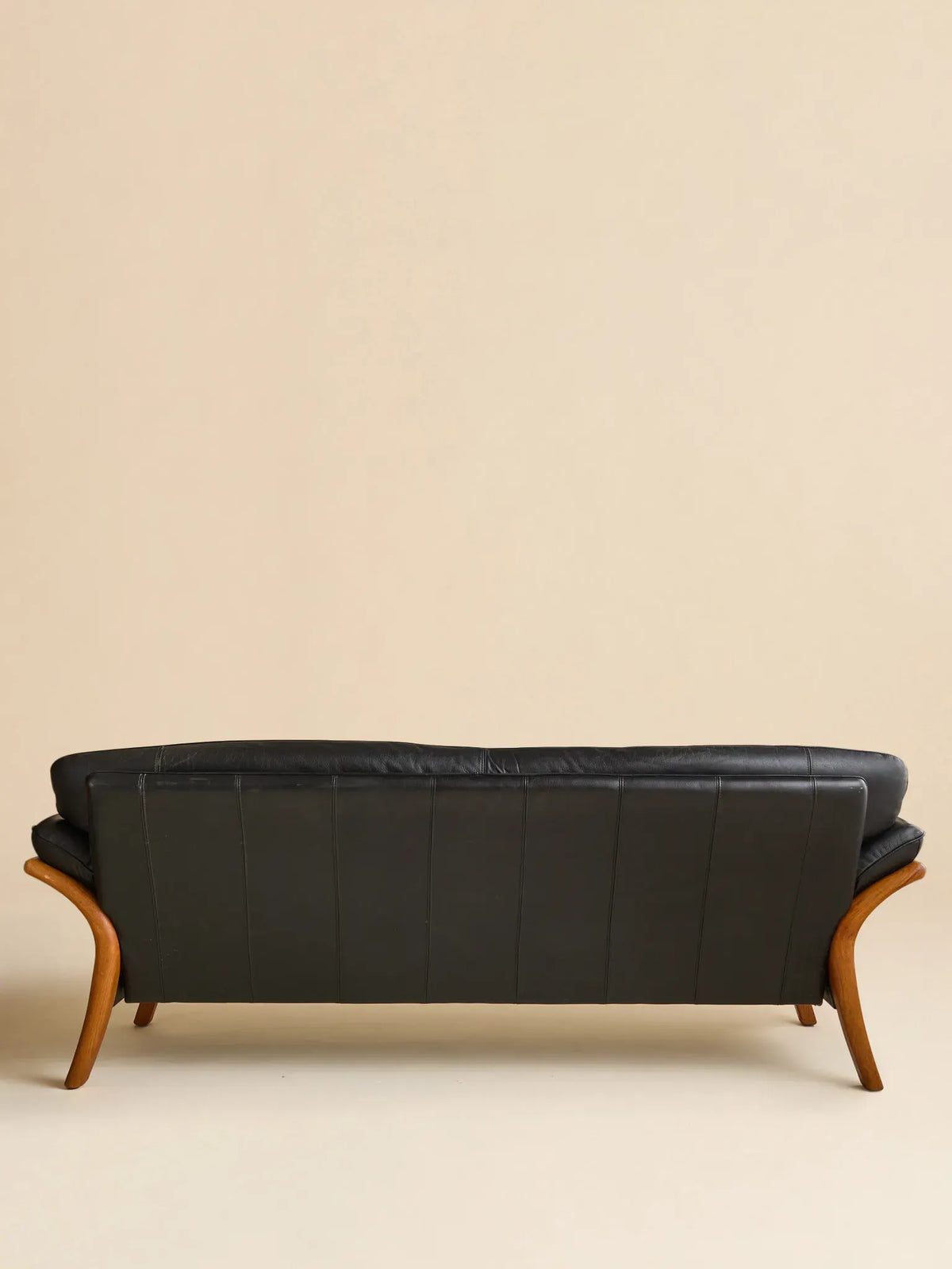 The Vintage Danish Teak & Leather SofaSeatingMiscellanea, etc.