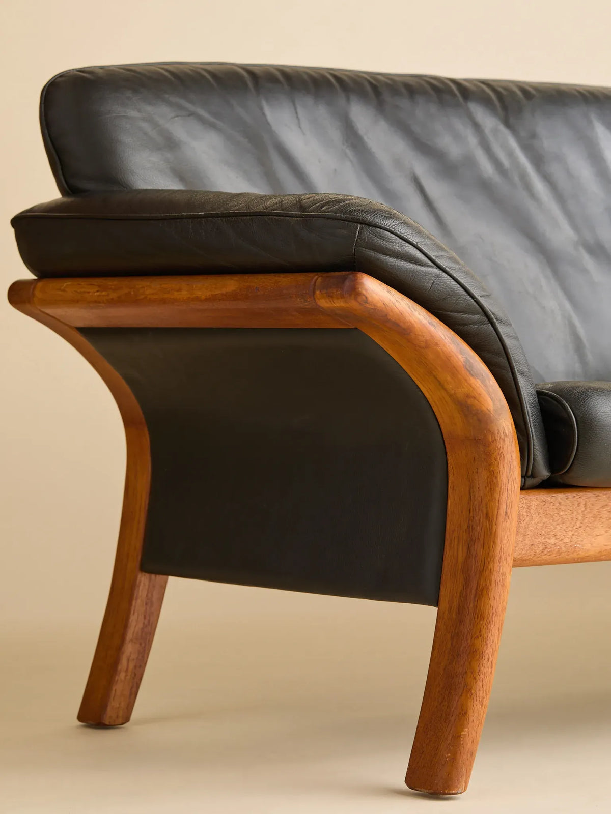 The Vintage Danish Teak & Leather SofaSeatingMiscellanea, etc.