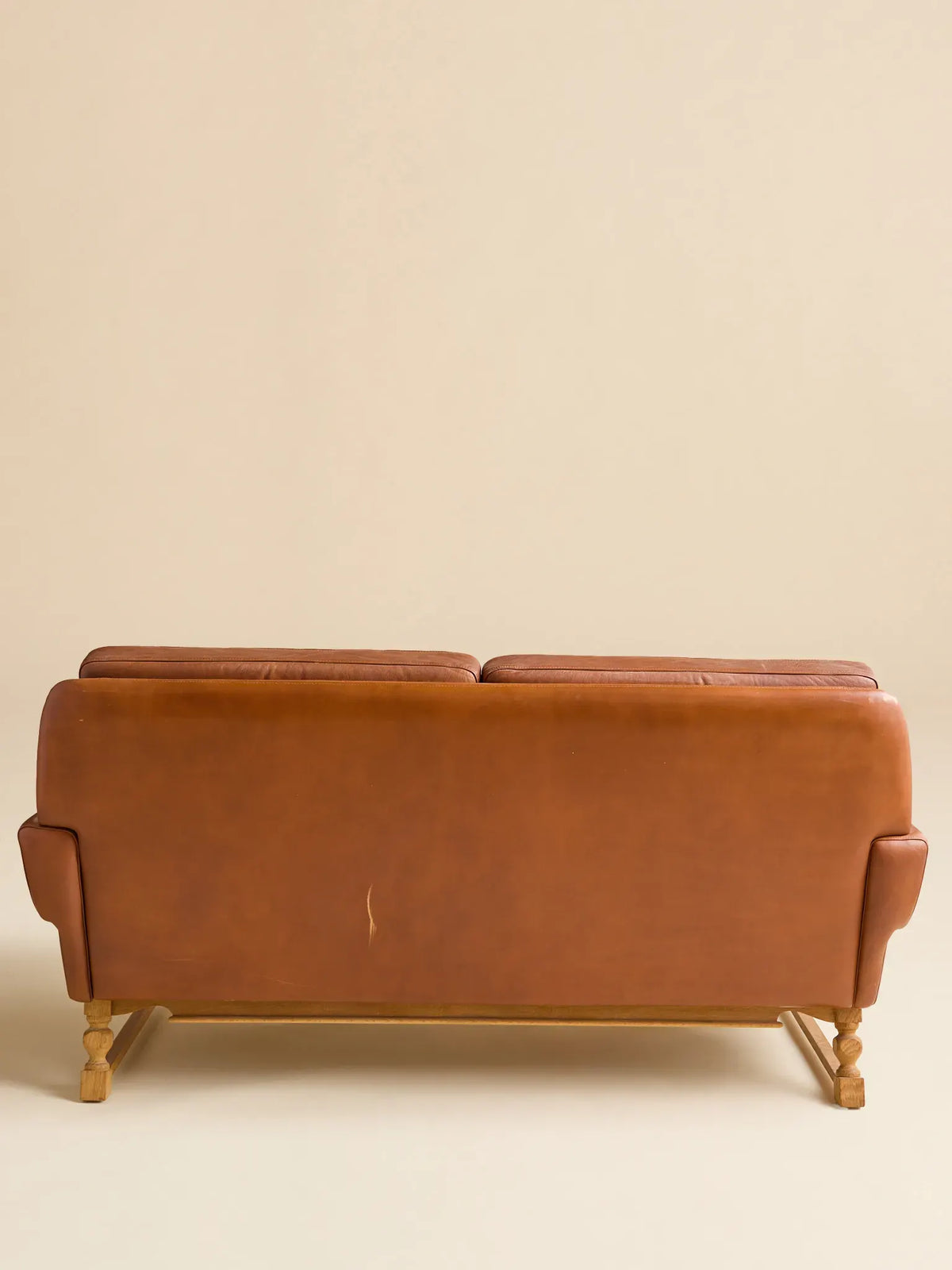 The Vintage Danish Mid-Century Leather LoveseatSeatingMiscellanea, etc.