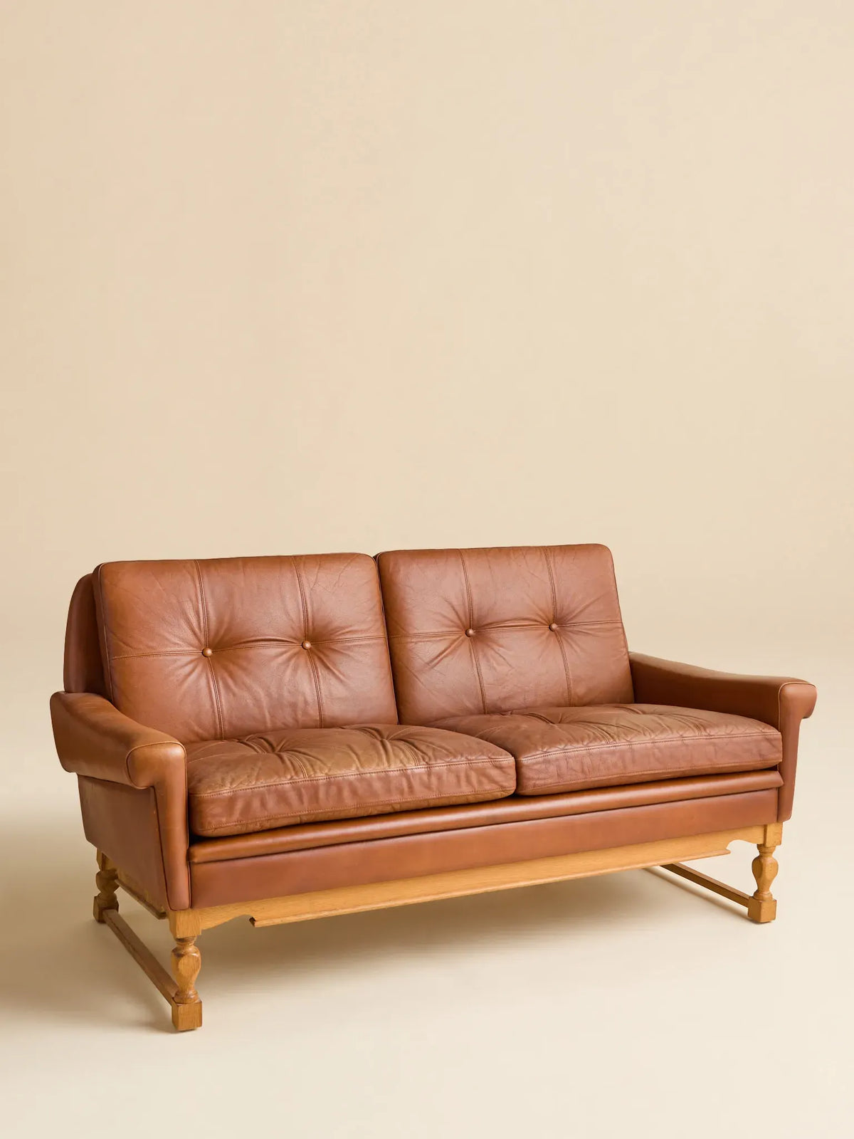 The Vintage Danish Mid-Century Leather LoveseatSeatingMiscellanea, etc.