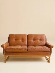 The Vintage Danish Mid-Century Leather LoveseatSeatingMiscellanea, etc.