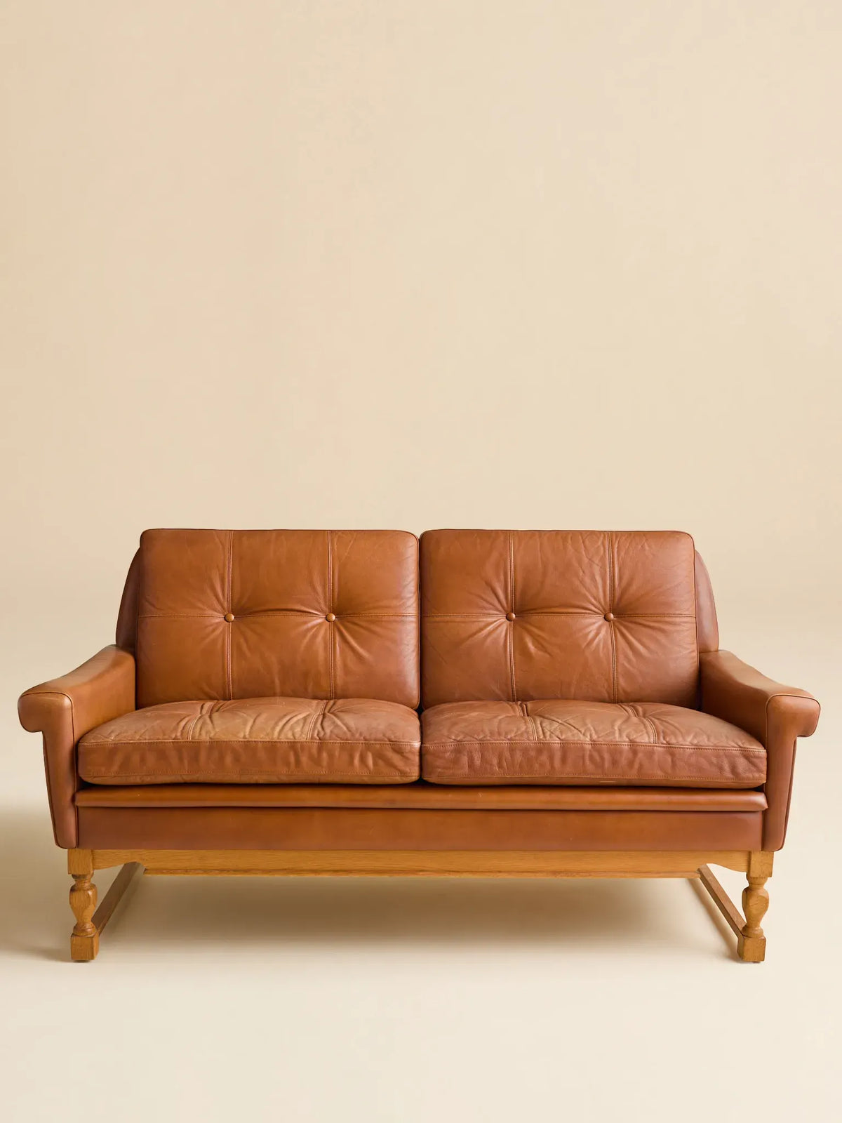 The Vintage Danish Mid-Century Leather LoveseatSeatingMiscellanea, etc.