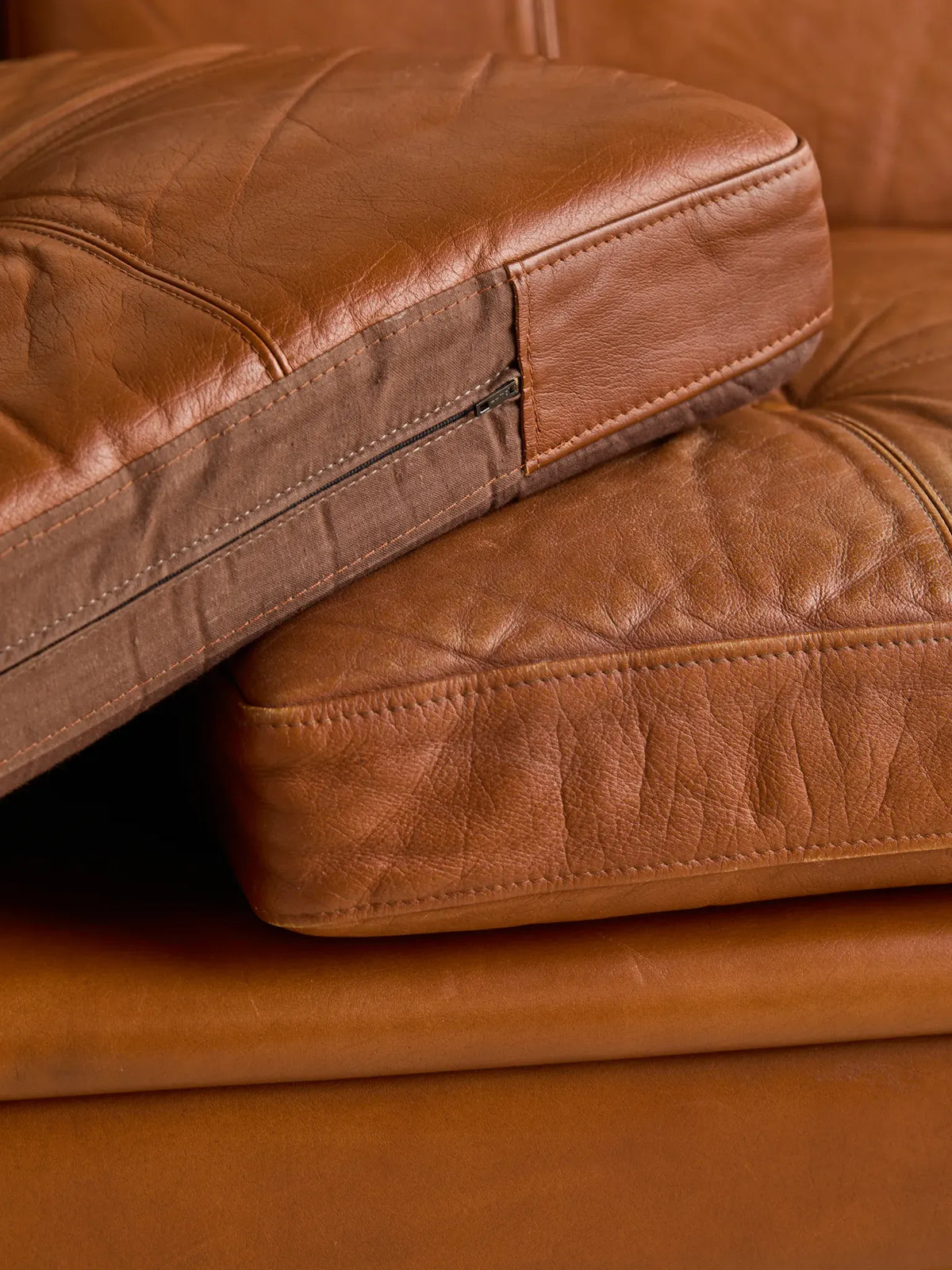 The Vintage Danish Mid-Century Leather LoveseatSeatingMiscellanea, etc.
