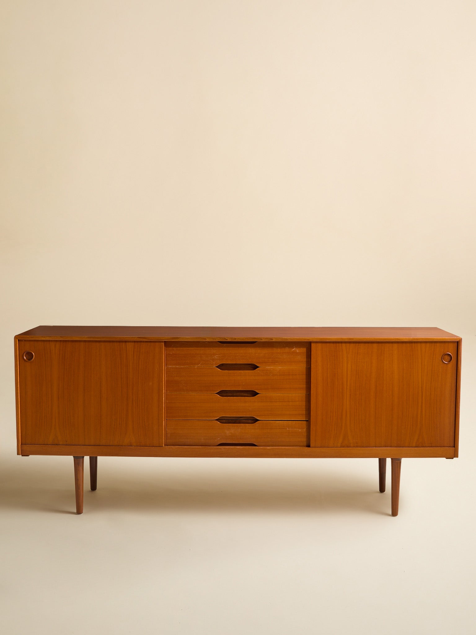 The Vintage Mid-Century Modern Gustav Bahus Teak CredenzaCredenzas and SideboardsMiscellanea, etc.