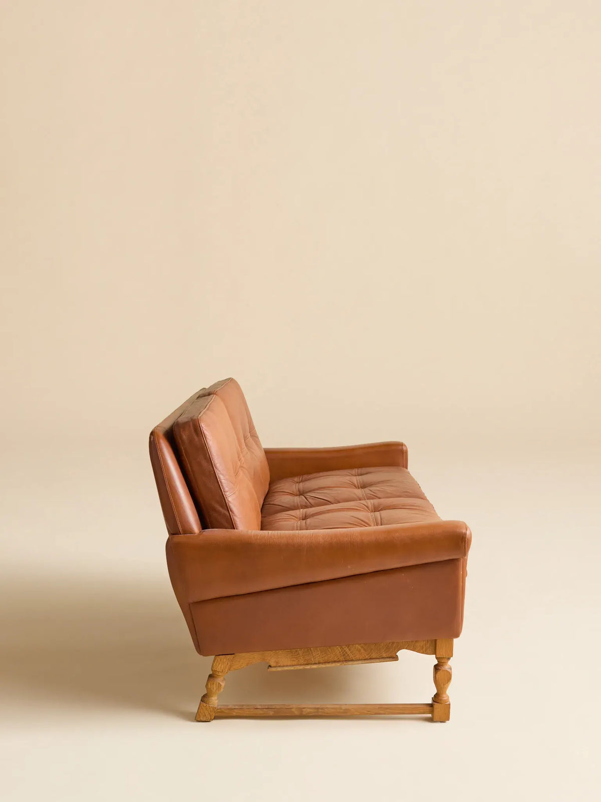 The Vintage Danish Mid-Century Leather LoveseatSeatingMiscellanea, etc.
