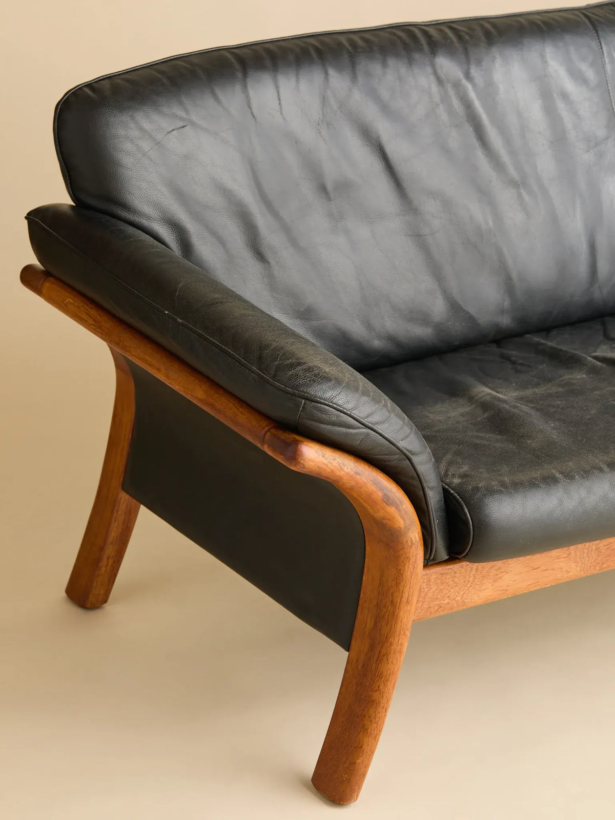The Vintage Danish Teak & Leather SofaSeatingMiscellanea, etc.