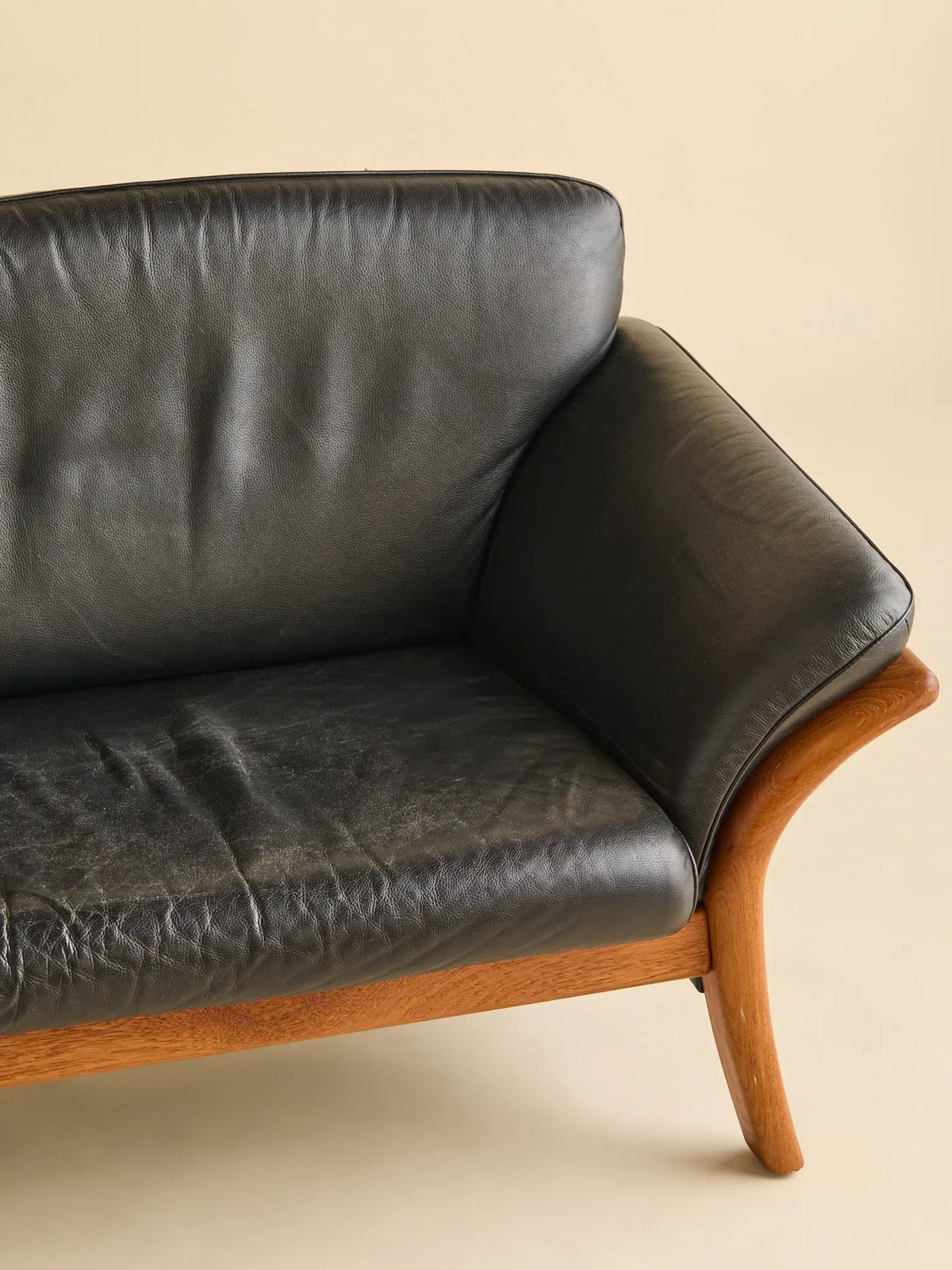 The Vintage Danish Teak & Leather SofaSeatingMiscellanea, etc.